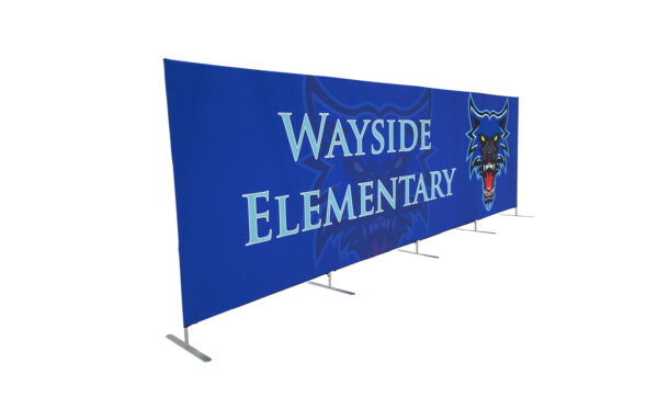 photo of twenty foot long renovate partition with snarling wolf head graphic and wayside elementary