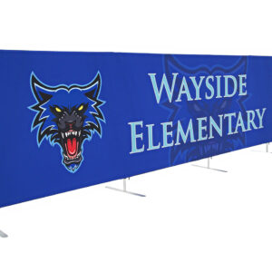 photo of twenty foot long flow partition with snarling wolf head graphic and wayside elementary