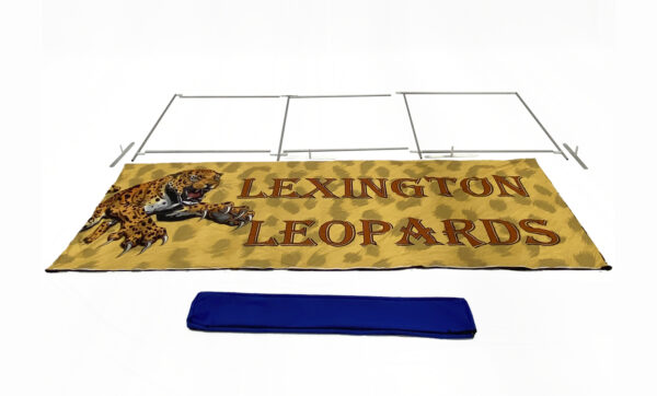 photo of fifteen foot renovate partition that says lexington leopards with a graphic of a pouncing leopard fully broken down into its individual pieces