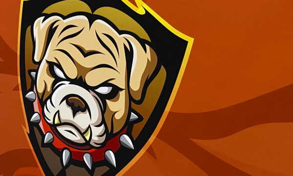 graphic of bull dog head in shield crest with orange background